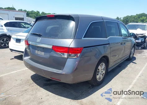 2014 Honda Odyssey Lx z USA, uszkodzony, nr VIN 5FNRL5H25EB118703
